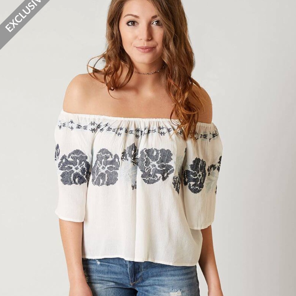 Off shoulder tulip back top